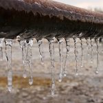 Frozen pipe with icicles can be avoided with furnace repair Ocean County